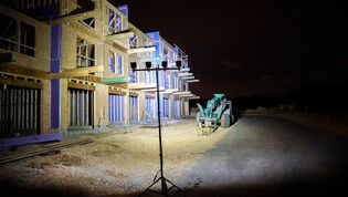 Quad LED Work Light Lighting up a Construction Site